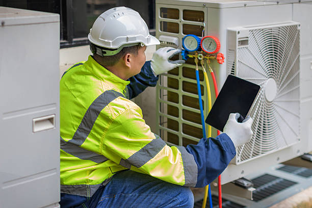 Professional Heat Pump Repair technician working in Rome City, IN